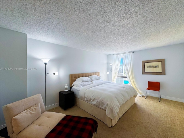 carpeted bedroom featuring a textured ceiling