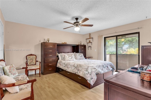 bedroom with ceiling fan, a textured ceiling, access to exterior, and light wood-type flooring