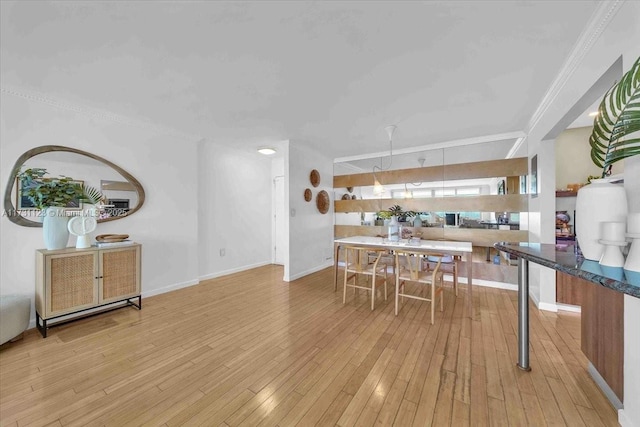 dining room with light hardwood / wood-style floors