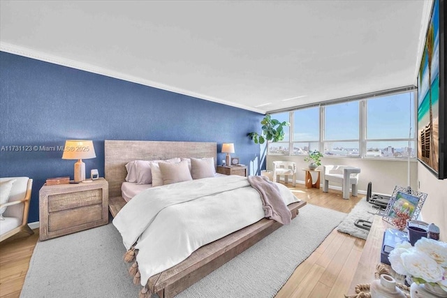 bedroom with light wood-type flooring