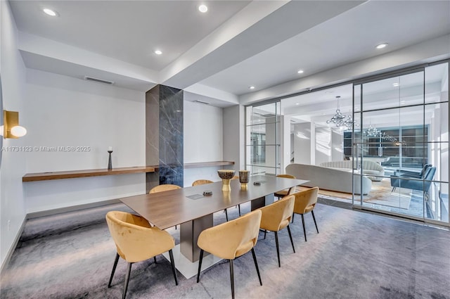 view of carpeted dining space