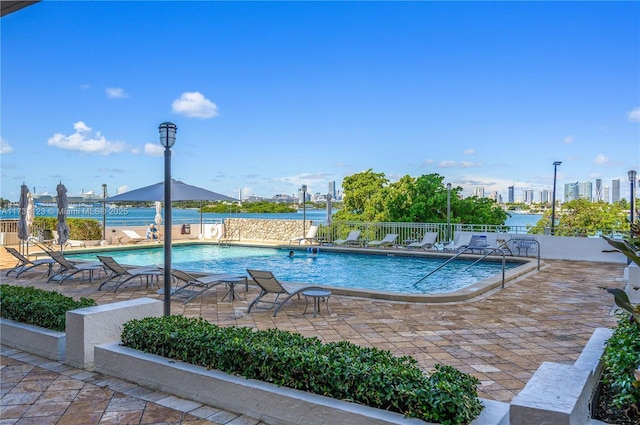 view of pool featuring a patio