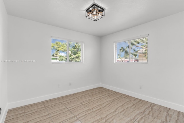 spare room with plenty of natural light