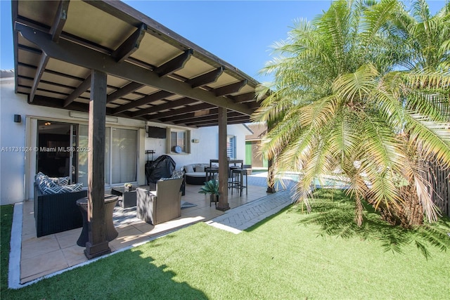 view of yard with outdoor lounge area and a patio