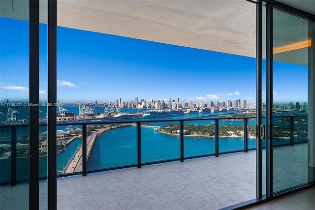 balcony featuring a water view