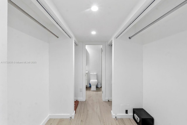 hallway featuring light hardwood / wood-style floors