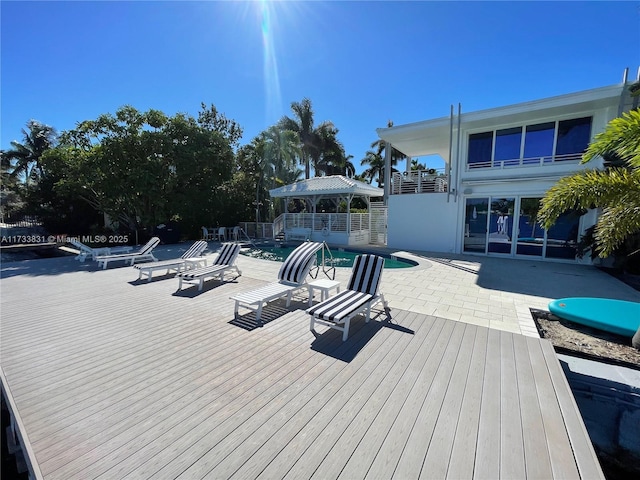 view of swimming pool with a patio area