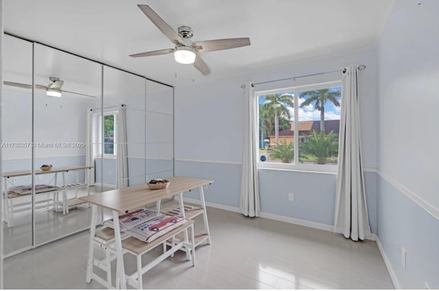 interior space featuring a wealth of natural light and ceiling fan