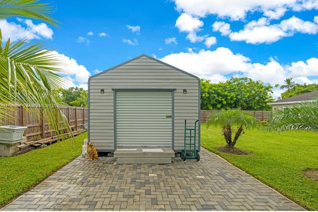 view of outdoor structure with a yard