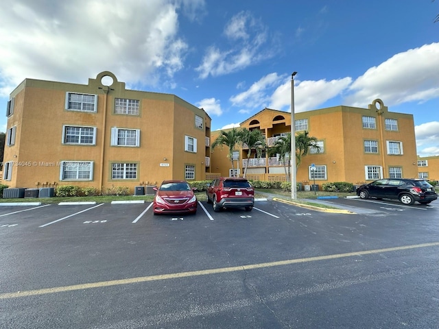 view of building exterior featuring central AC