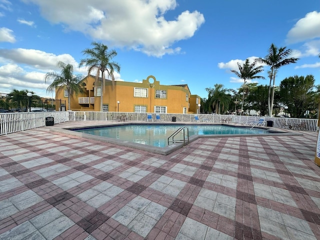 view of pool featuring a patio area