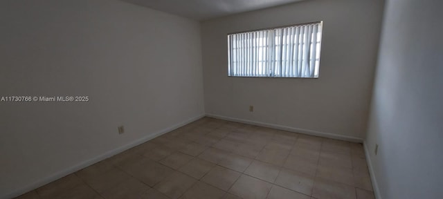 view of tiled empty room