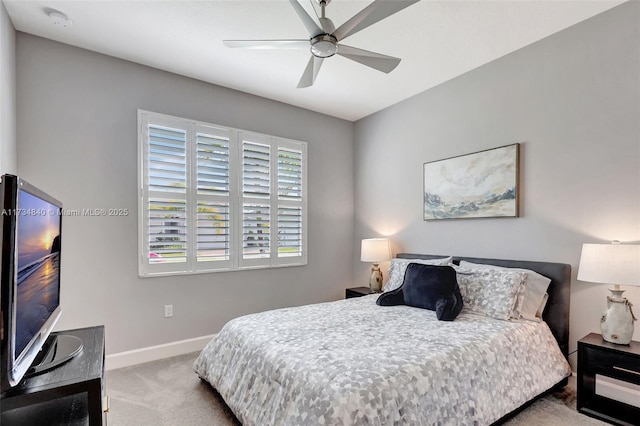 13597 SW Oceanus Blvd, Port St Lucie, FL 34987 - bedroom with carpet flooring, baseboards, and ceiling fan