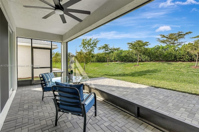 view of patio / terrace with a ceiling fan