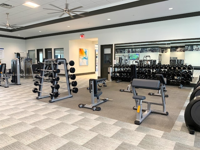 gym featuring a ceiling fan and carpet flooring