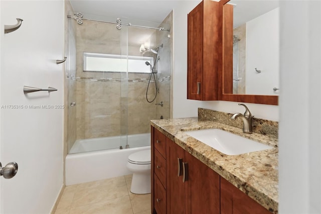 full bathroom with enclosed tub / shower combo, toilet, tile patterned floors, and vanity