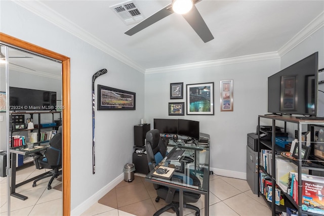 tiled home office featuring ceiling fan and ornamental molding