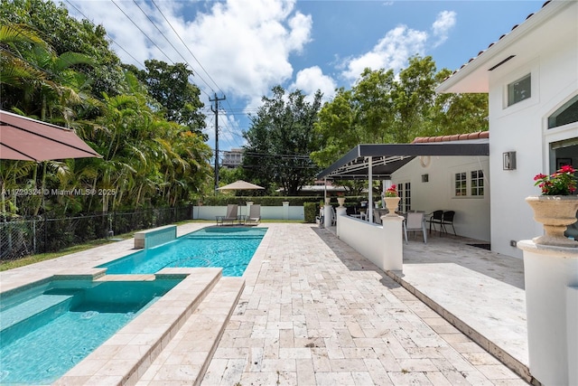 view of pool featuring a patio area