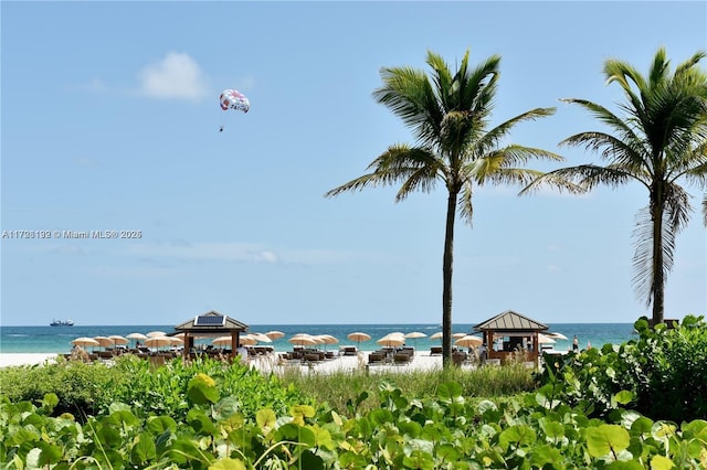 property view of water featuring a gazebo and a view of the beach