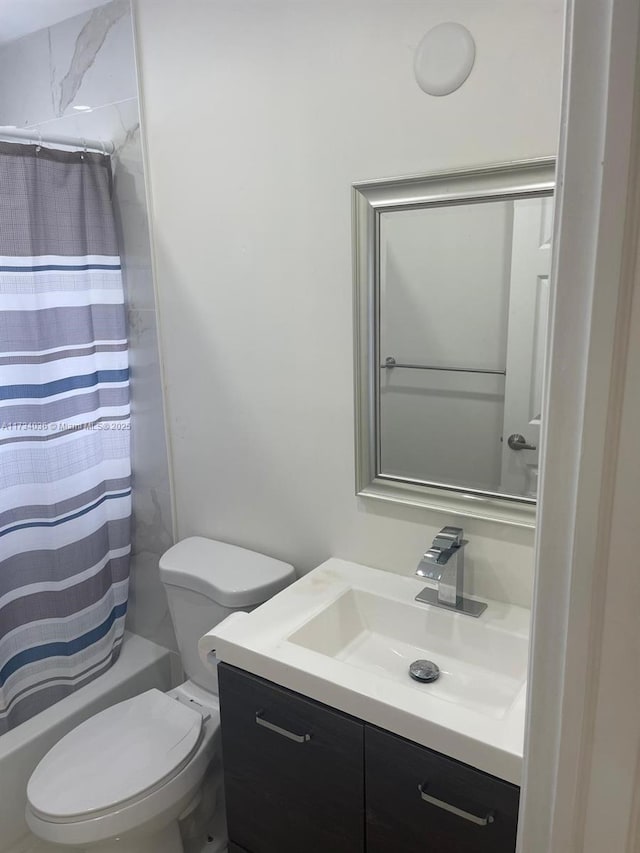 full bathroom featuring vanity, toilet, and shower / bathtub combination with curtain