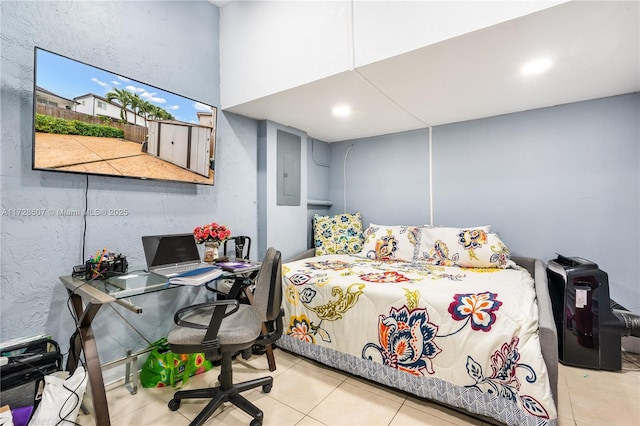 bedroom with light tile patterned floors and electric panel