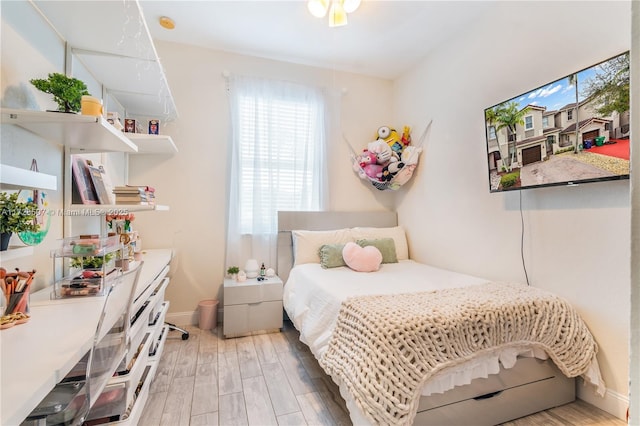 bedroom featuring wood-type flooring