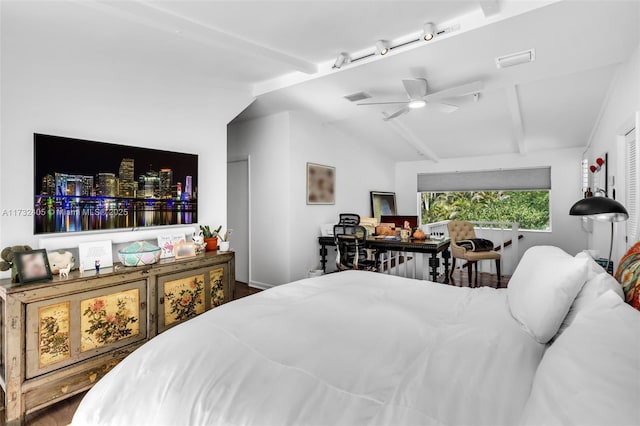 bedroom with vaulted ceiling with beams and ceiling fan