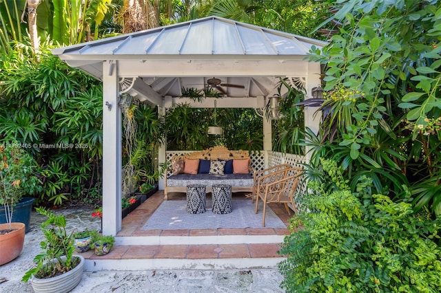 view of patio / terrace featuring a gazebo and ceiling fan