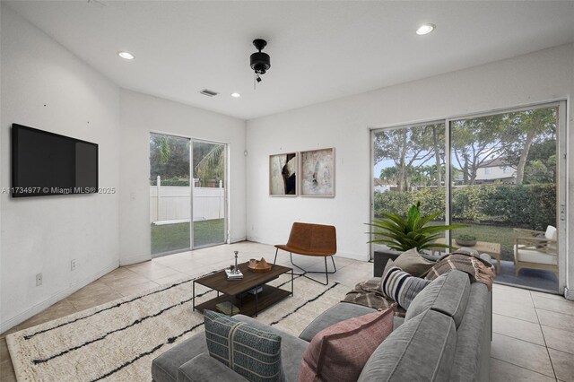 living room with light tile patterned floors