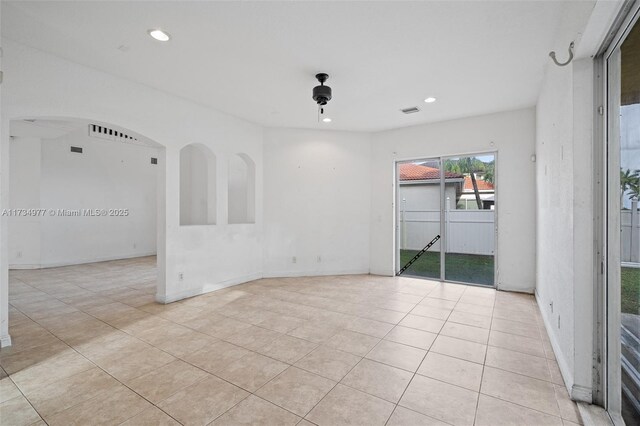 view of tiled spare room