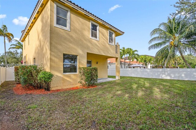 entrance to property with a patio area