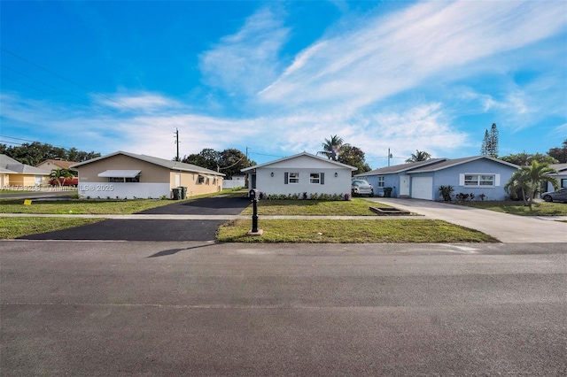 ranch-style house with a front yard