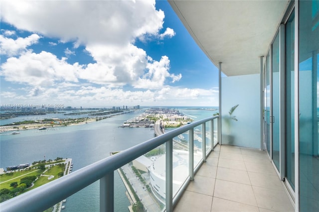 balcony featuring a water view