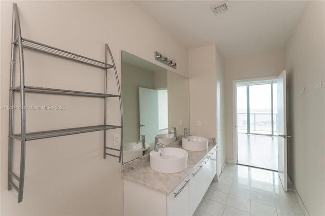 bathroom featuring vanity and tile patterned floors