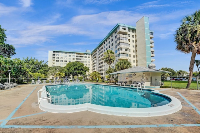 view of pool featuring a patio