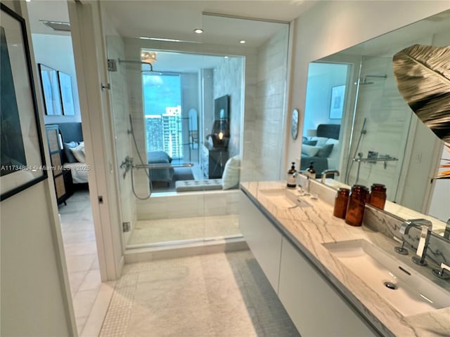 bathroom with vanity and an enclosed shower