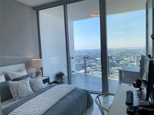 bedroom with a wall of windows