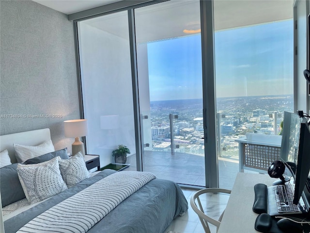 bedroom with floor to ceiling windows