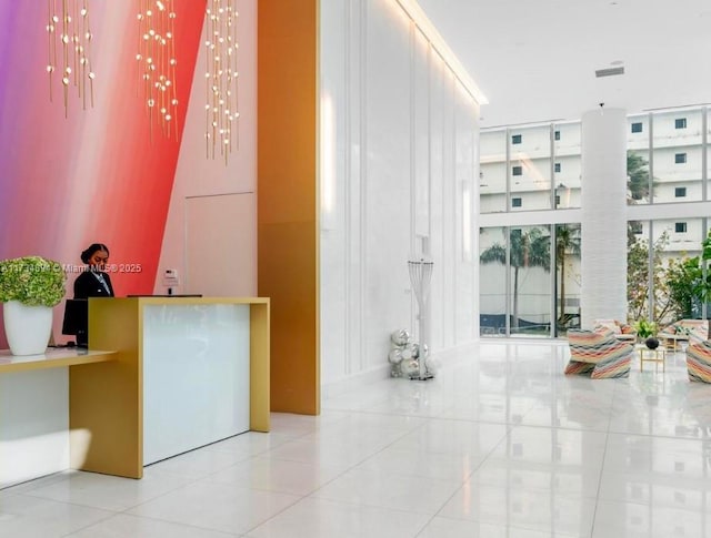 reception area with an inviting chandelier