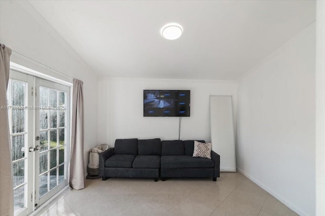 tiled living room featuring french doors