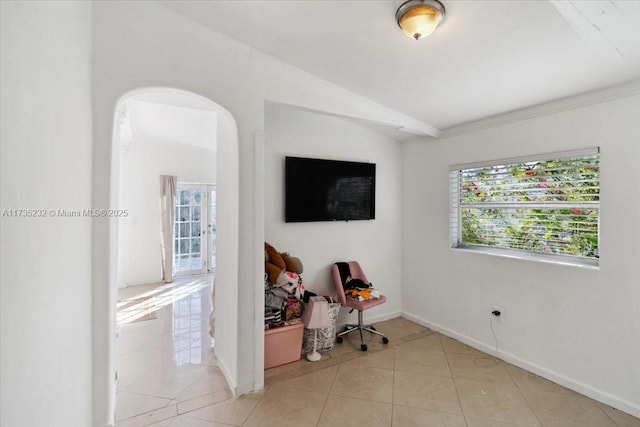 tiled office space with vaulted ceiling