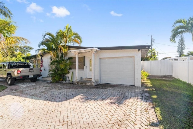 ranch-style house with a garage