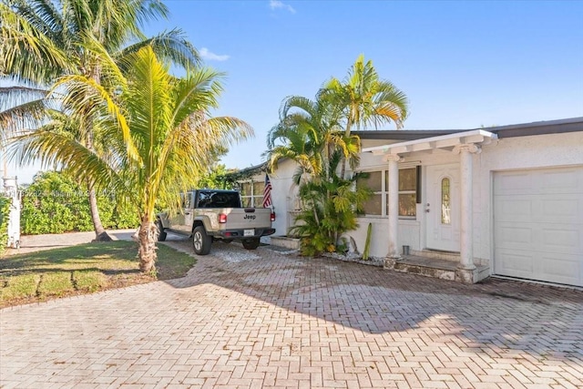 view of front of home with a garage