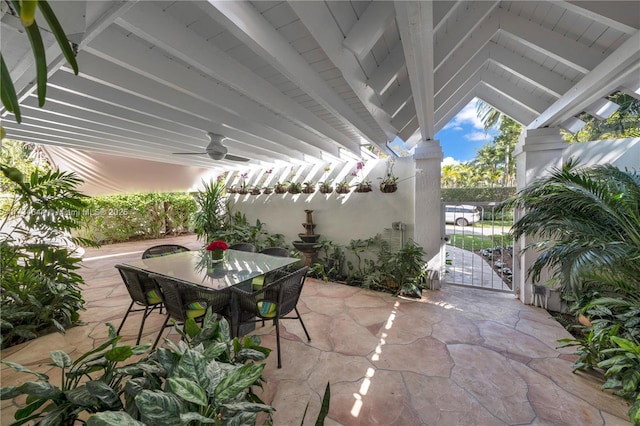 view of patio featuring ceiling fan