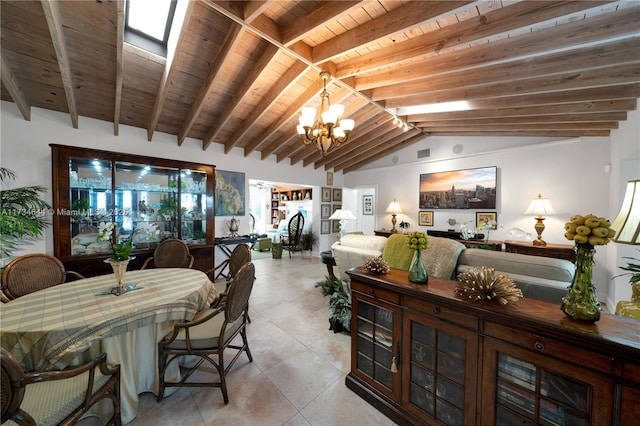 dining area with wooden ceiling, vaulted ceiling with skylight, a notable chandelier, and light tile patterned floors