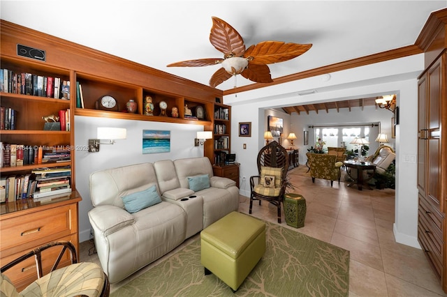 tiled living room with ornamental molding and ceiling fan with notable chandelier