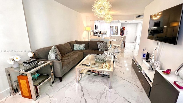 living room featuring an inviting chandelier