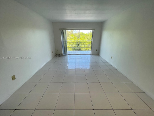 empty room featuring light tile patterned floors