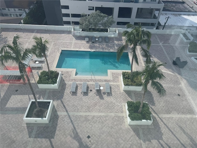 view of pool featuring a patio