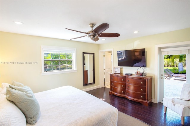 bedroom with dark wood-type flooring, ceiling fan, and access to exterior